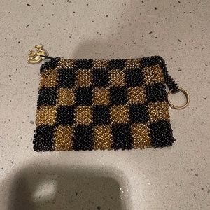 black and gold coin purse